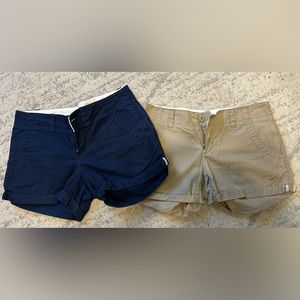 2 PAIRS NIKE GOLF SHORTS, size 6, khaki and navy colors.